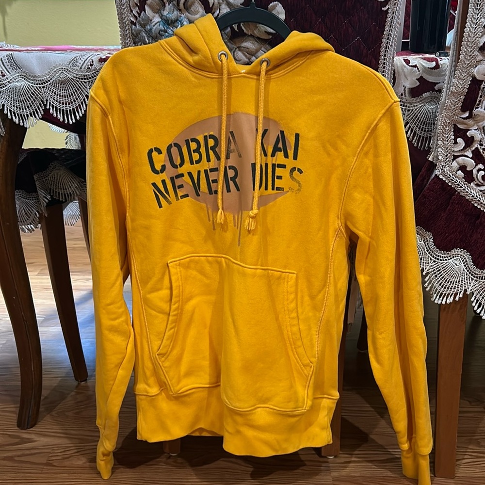 Yellow Cobra Kai Hoodie “Cobra Kai Never Dies”